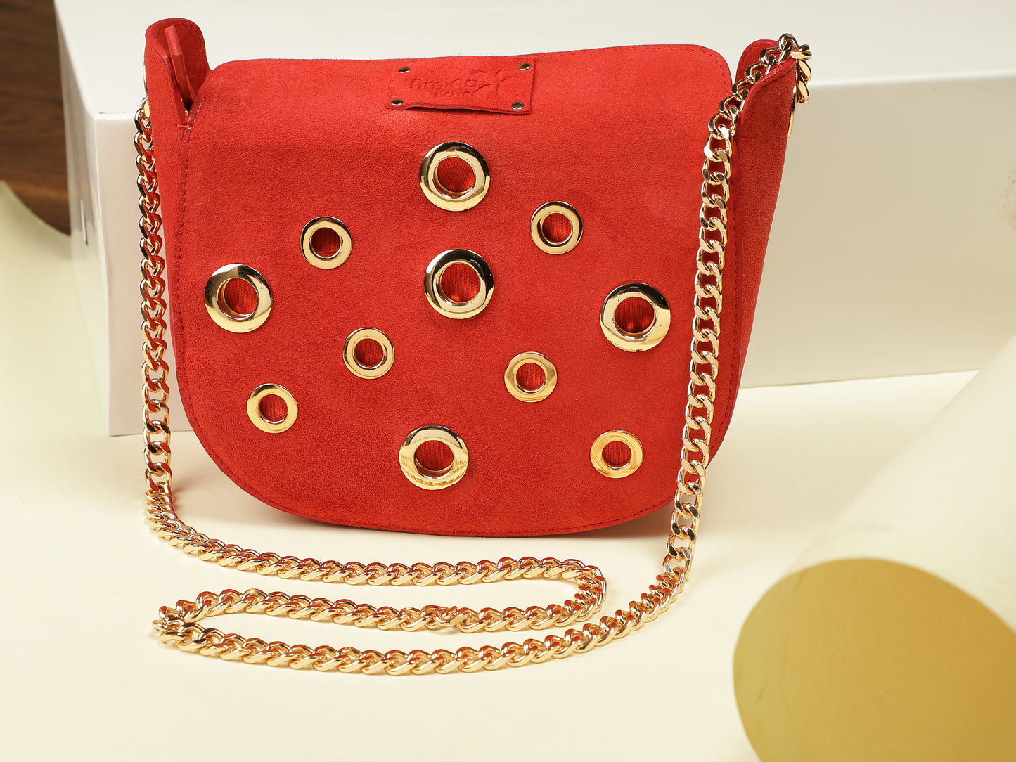 Red Eyelet Sling Bag