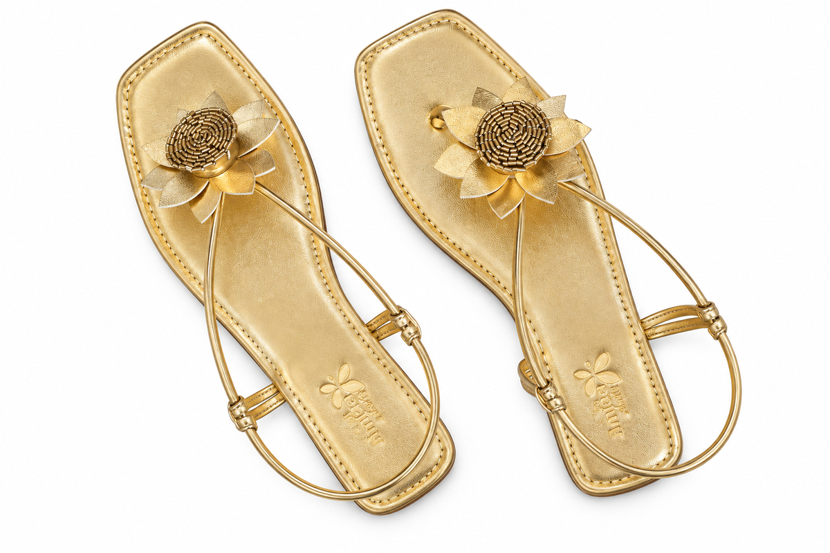 Women’s Golden Flat Sandals with Floral Embellishment