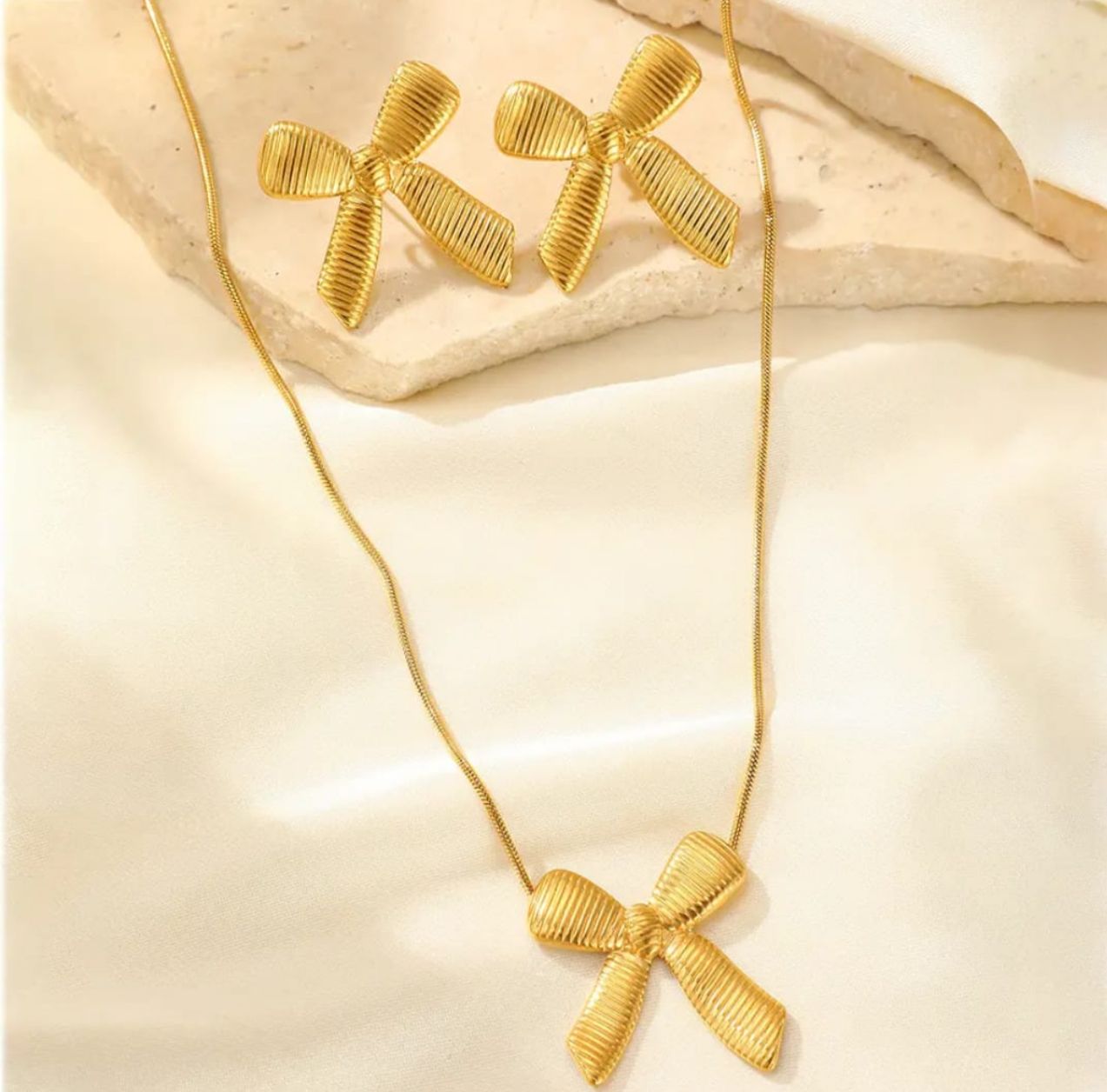 Dazelio Luxe Gold Bow Statement Earrings with Textured Finish