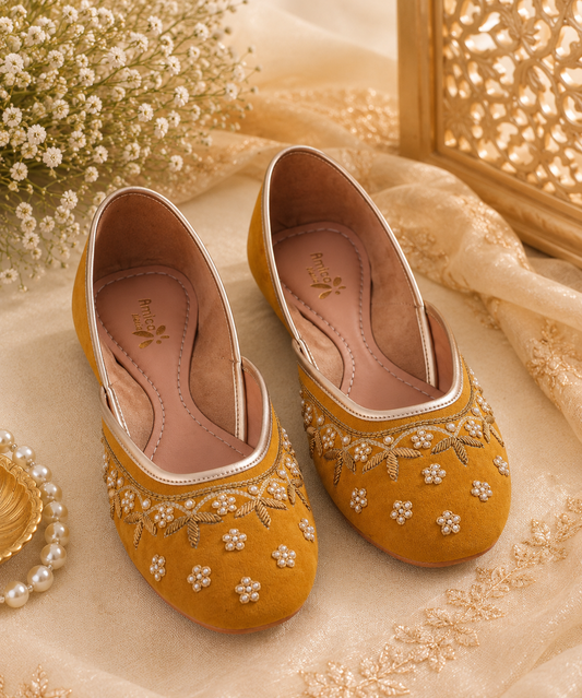 AmicaSlexia Women Mustard Embroidered Jutti