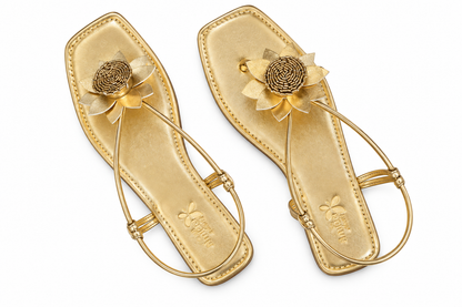 Women’s Golden Flat Sandals with Floral Embellishment